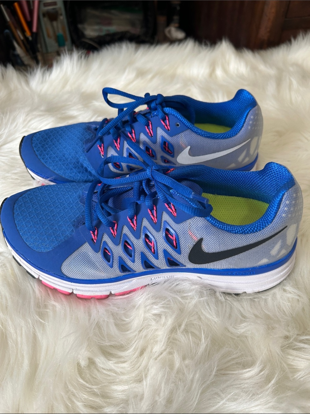 Nike Women’s Blue Athletic Running Shoes with Pink Accents